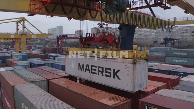 Sea port, Container warehouse, port cranes, crane lifts container Port, warehouse, containers,...
