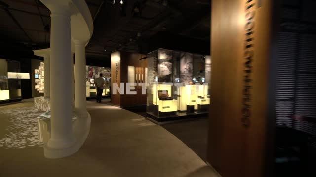 Museum Hall Museum, exhibition hall, exhibits, showcases, stands, lamps, semi-darkness, suitcases,...