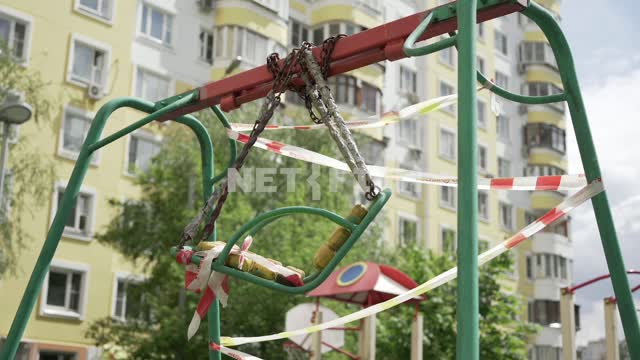 Closed swing on the Playground.
Restrictions due to coronavirus in Moscow quarantine, virus,...
