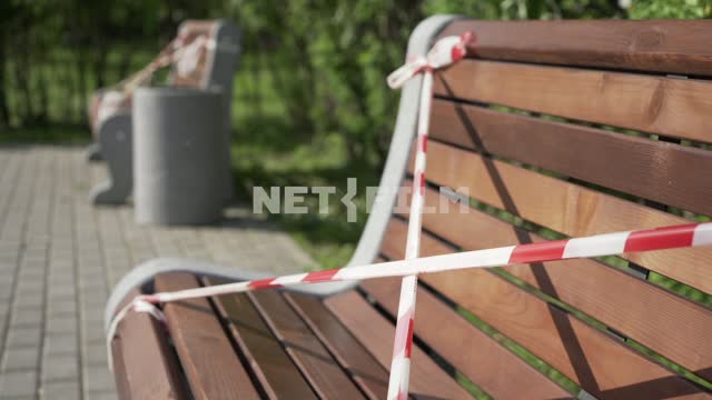 Signal tapes on the benches in the residential yard.
Quarantine in Moscow quarantine, virus,...