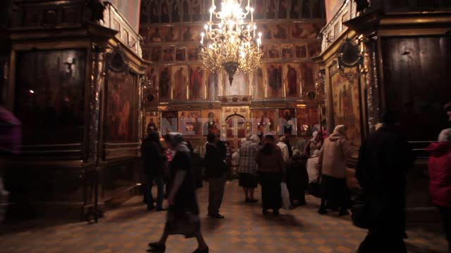 Trinity-St. Sergius Lavra, parishioners in the church, shooting with movement in the halls...