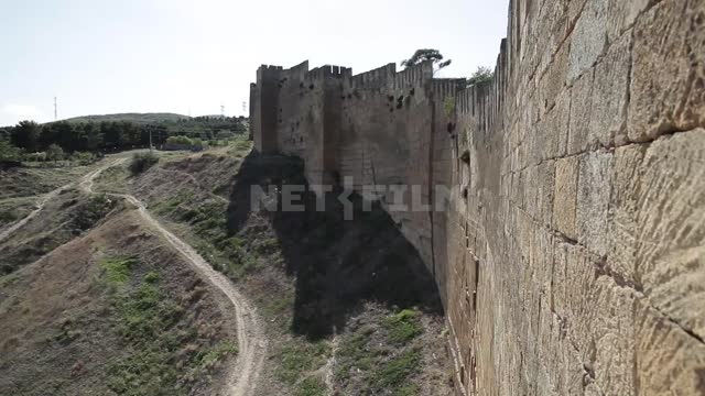 Derbent, an ancient fortress on the hills, shooting with movement, with an overview of the fortress...