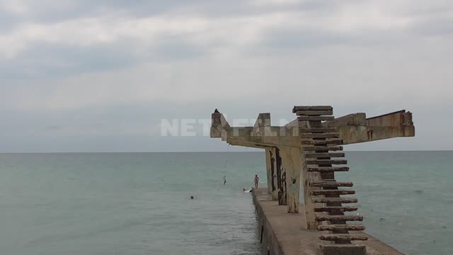 The Black Sea, a broken aerarium with people jumping into the sea Aerarium, sea, waves, vacation,...