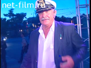 Footage Nikita Mikhalkov in a captain's cap walks down the street, MIFF XXVII. (2005)