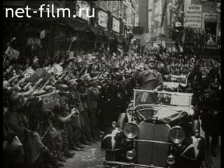 Footage Hitler rides through the streets. (1933 - 1944)