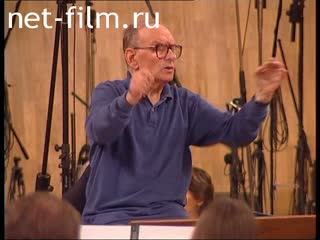 Footage Composer Ennio Morricone rehearses with the orchestra.. (2005)