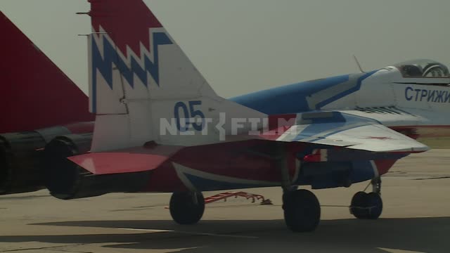 Aircraft at the airport aerobatic team "Swifts" travel camera on the aircraft. Fighter aircraft