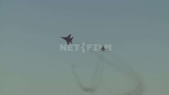 Simulated air combat.
Two planes in the sky. Aircraft fighter