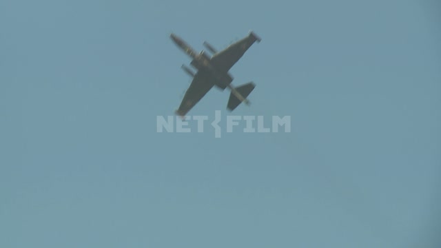 Military aircraft performing aerobatics. The plane attack