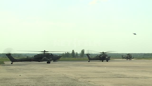 Helicopters at the airport ready to take off. Military helicopters