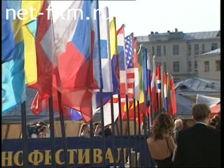 Flags of different countries swaying in the wind. (2002)