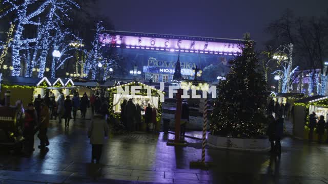 Pushkin Square. New Year.
Cinema Russia.
Winter illumination.
People.
Garlands on the...