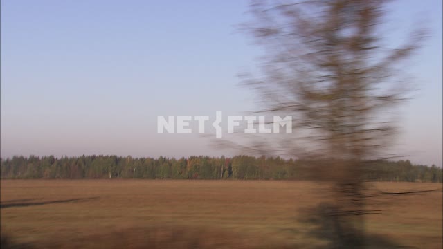 View from the window of a moving car on the highway.
 Nature.
A machine.
Drive from left to...