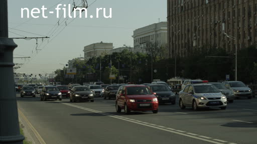 The traffic on Prospect Mira. Moscow.
Summer.
Day.
metro Alekseevskaya.
The sky is clear.