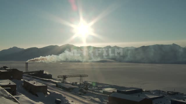 Views of the power plant in Barentsburg and the mountains (fast mode) Russian North, port, sea,...