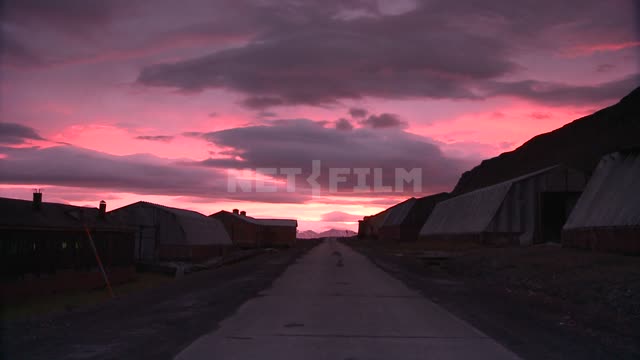 Sunset in the town of Svalbard Russian North, road, sheds, horizon, clouds, sunset, evening, pink...