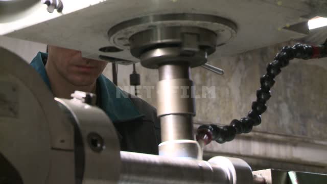 Milling workpieces on a milling machine. Russian North, lathe, mill, workbench, detail, drill,...