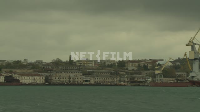 Panorama of the sea port. Sevastopol.
The black sea.
Cranes.
Ships.
Autumn.