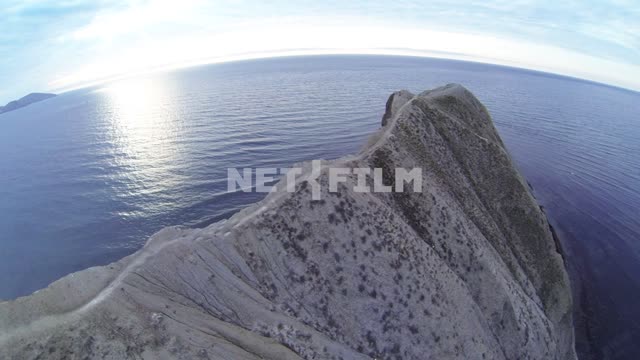 Shooting the Black sea and the Cape Chameleon with quadcopter Koktebel, aerial, Black sea,...