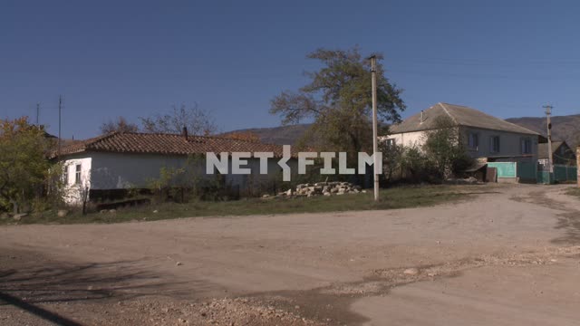House in the square in the village. Koktebel, area, intersection, street, house, village, gravel,...