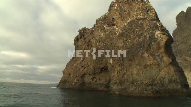 Shooting from a boat the Kara Dag mountain and the cliffs of the Golden Gate. Koktebel, mountains,...