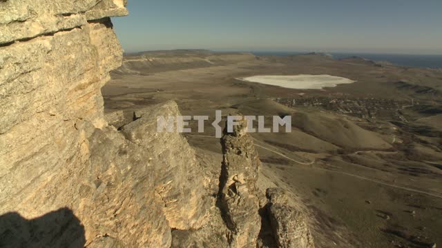 View from cliffs on lake Barakol in the valley. Koktebel, rock, mountain, lake, valley.