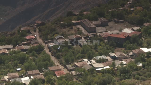 The village in the mountains of Armenia. Nature.
Mountains.
Road.
Of the building.
Trees.