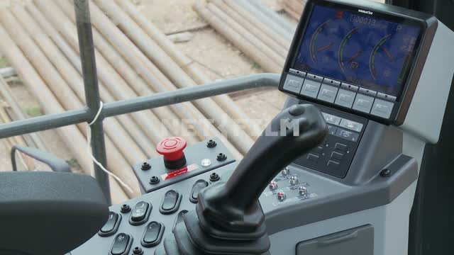 Control cab excavator Komatsu PC2000-8. Cabin, levers, joysticks, pedals, console, bucket,...