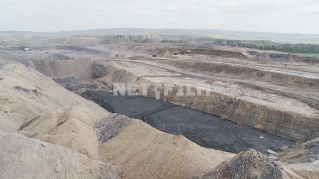 Panorama of the quarry. Quarry, coal, slag heap, hill, heap.