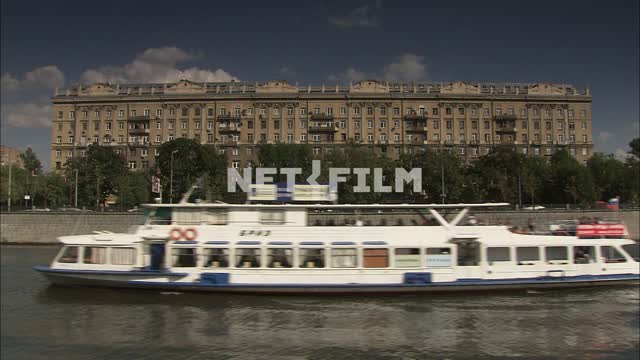 Pleasure boat floats on the Moscow river Embankment, motor ship,
shooting from motion
sunny...